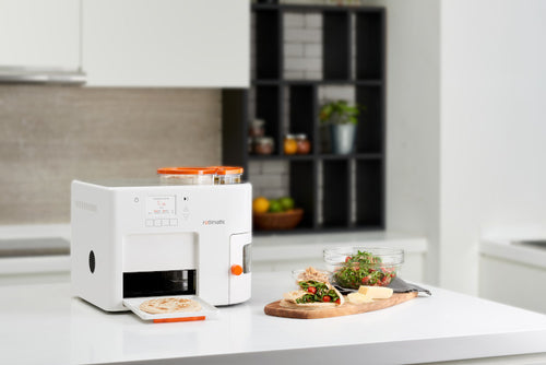 Rotimatic Machine making roti on a kitchen countertop