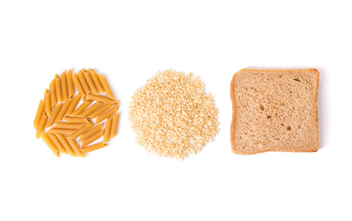 A slice of bread, pasta and cereal on a white background